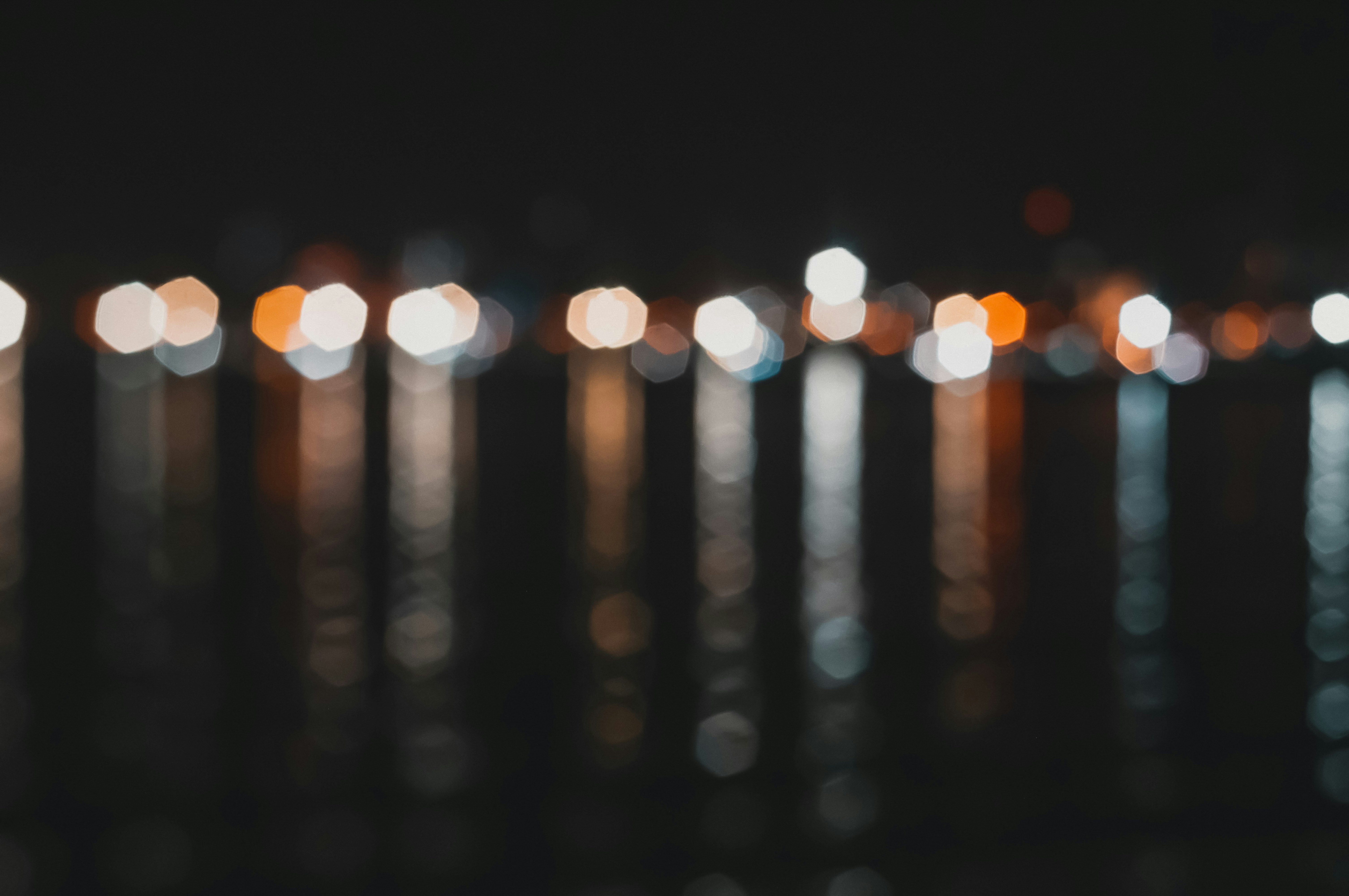 bokeh photography of city lights during night time